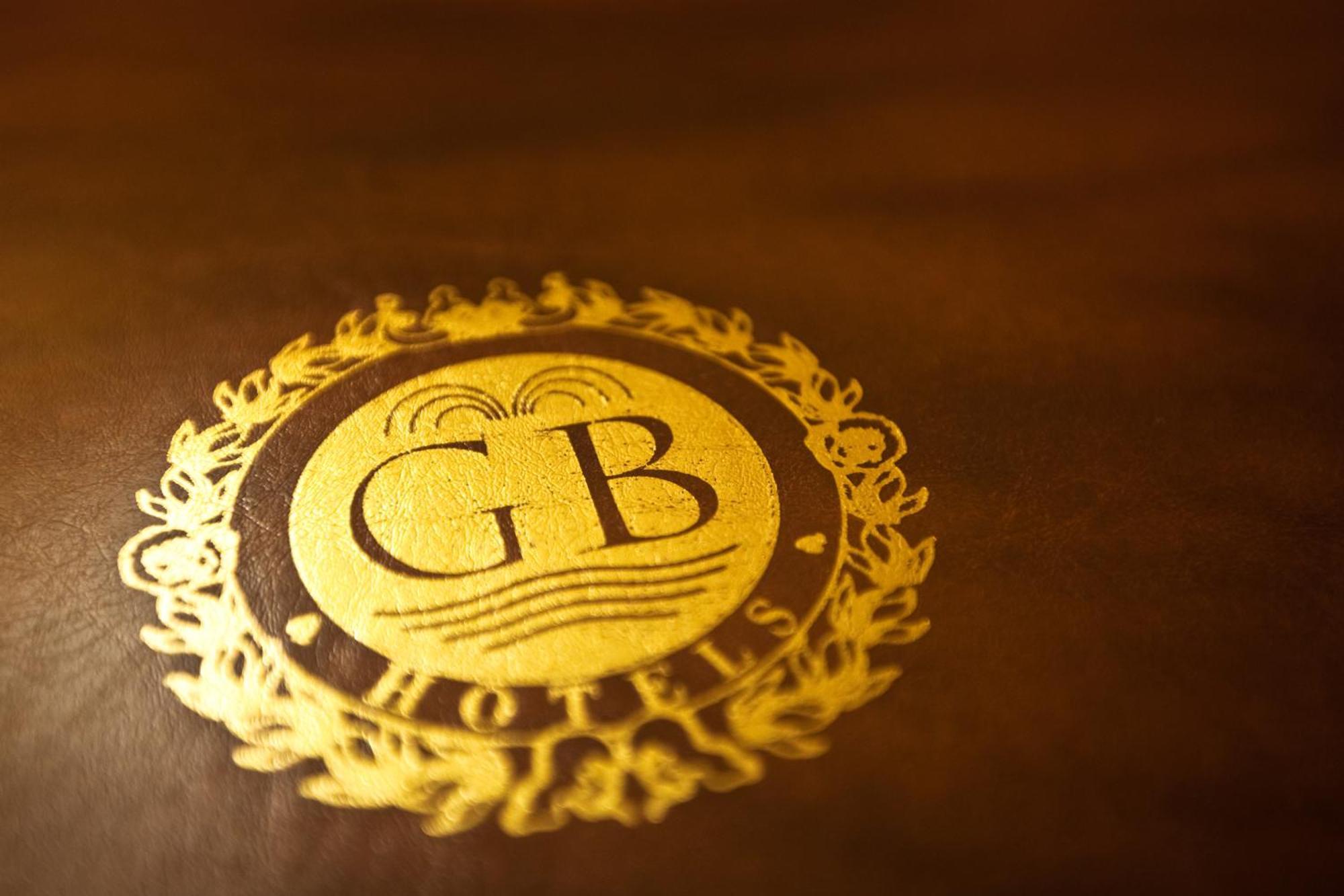 Grand Hotel Trieste & Victoria Abano Terme Bagian luar foto Gold-embossed monogram